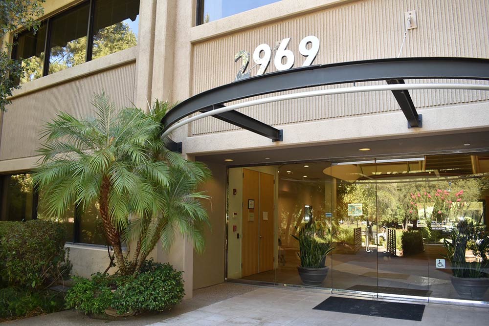 Building Front Door of KCM Commercial Property Management in Rancho Cordova, CA
